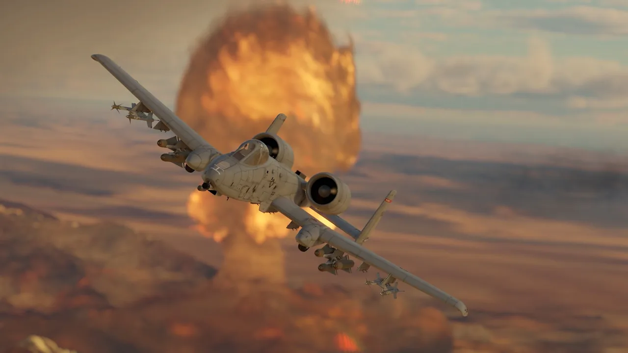 An attack jet flies past a large fireball in War Thunder promotional footage